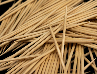 Wooden toothpicks in the foreground