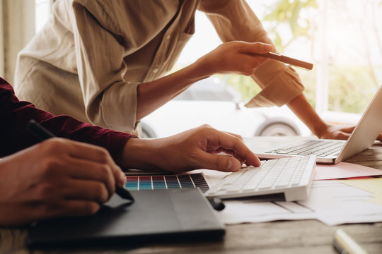 Web designer meeting  planning application for mobile phone. Design Online Technology Content, Ideas Proposal Strategy Tactics Vision Design Concept