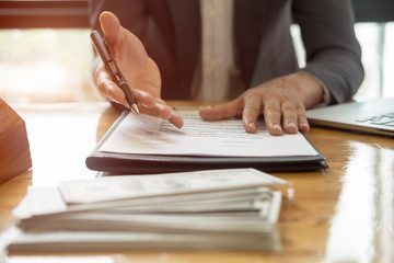 Close up business man reaching out sheet with contract agreement proposing to sign.Full and...