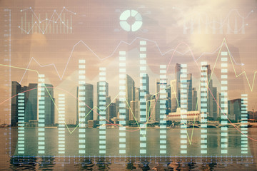 Forex chart on cityscape with tall buildings background multi exposure. Financial research concept.