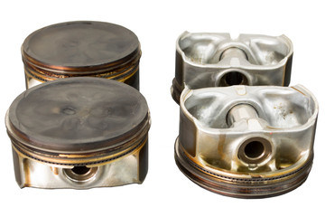 Four old pistons
