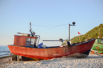 fisherman boats at sunrise time on the beach