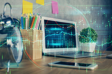 Multi exposure of graph and financial info and work space with computer background. Concept of international online trading.