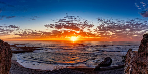 Fototapeta na wymiar Panorama of Ocean at Sunset in Cove, Bay