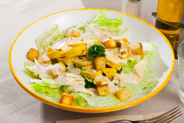 Fresh Caesar salad with chicken