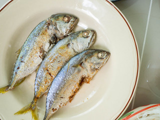 Food name Fried mackerel on dish white,Street food in Bangkok,Healthy for body