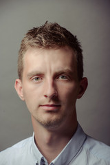 Obraz premium Portrait of a smart serious young man