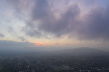 Gloucestershire UK aerial view at dawn with clouds and industrial units