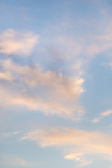 Naklejka na ściany i meble Blue sky with clouds just before sunset