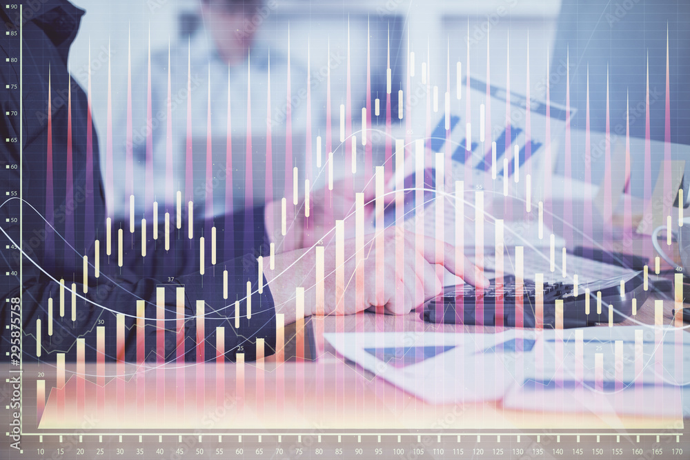 Poster Double exposure of graph with man typing on computer in office on background. Concept of hard work. Closeup.