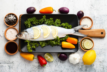 Top view arrangement with fish and vegetables