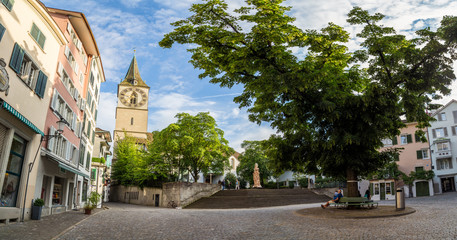 Fototapeta premium Public square in front of St. Peter church in Zurich, Switzerland.