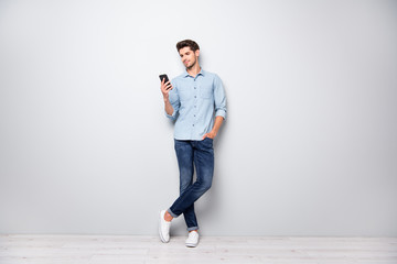 Full size photo of concentrated smm worker man use cellphone answer sms messages have online...