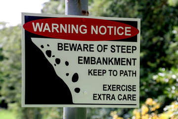 Steep Embankment Warning Sign on a Country Path © bigal04uk