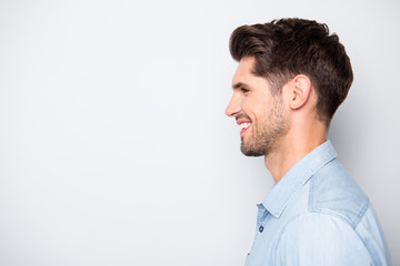 Profile side photo of charming satisfied positive man enjoy weekends have fun with his friends family wear denim jeans casual style clothes isolated over grey color background