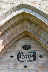 Obraz premium Karl xiv johan monogram on a wall, an old Swedish king