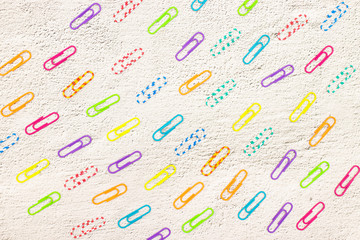 Colored paper clips on the table 