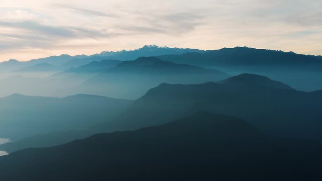 Mountains in the misty morning, Pico Cristobal Colon, Pico Simon Bolivar in the distance, Highest peaks of Colombia, drone aerail timelapse