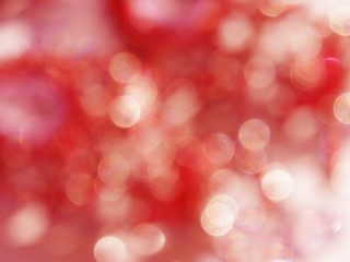 abstract red background soft blurred christmas lights garland