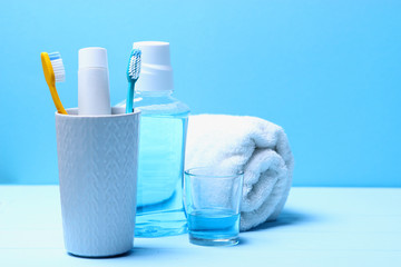 Toothbrushes and oral cleaners on the table.