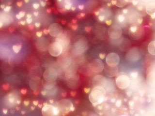 Obraz na płótnie Canvas love abstract background shiny hearts colorful blurs