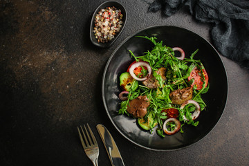 healthy salad with liver (tasty appetizer) menu concept. food background. copy space. Top view