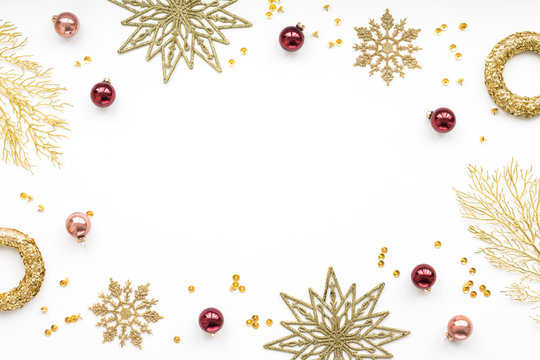 Gold And Red Christmas Decoration On White Background, Flat Lay, Top View