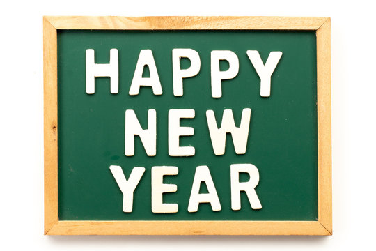 Letter in word happy new year on blackboard in white background
