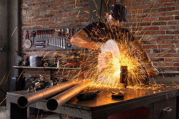 Man doing metalwork in a workshop