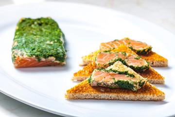 Still life of marinated salmon in dill