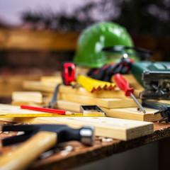 Carpenter's square, carpentry tools on a work table. Construction industry, housework do it yourself. Stock photography.