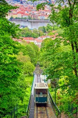 Zelfklevend Fotobehang A view of Prague, Czech Republic and the funicular from Petrin Hill on a sunny day. © Jbyard