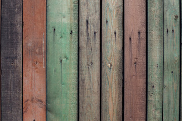 Boards with old paint in different colors.