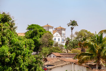 Pirenopolis, Goias, Brazil, October 18, 2019: The landscape at the end of the day and the towers of Nossa Senhora do Rosário Church in the historic center of Pirenopolis