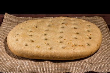 Italian bread focaccia. Traditional Italian pie, homemade bread