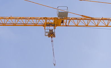 Lifting faucet on a background sky