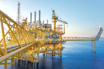 Fototapeta premium Offshore oil and gas rig platform with beautiful sky in the gulf of Thailand.