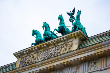 Obraz premium Wide-angle view of Berlin skyline with famous TV tower at Alexanderplatz and dramatic cloudscape in beautiful twilight during blue hour at dusk in summer, central Berlin Mitte, Germany