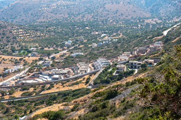Plaka, Lisithi, Crete, Greece. October 2019.  Building development of new homes on the mountainside in Plaka, Crete.
