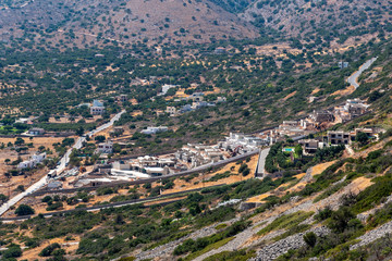 Plaka, Lisithi, Crete, Greece. October 2019.  Building development of new homes on the mountainside in Plaka, Crete.