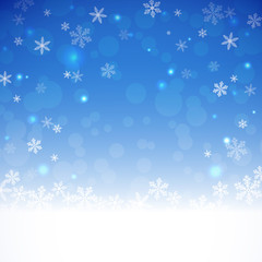 Christmas holiday background. Christmas evening. Snowfall .Bokeh, sparkles and snowflakes.Blue night background. Eps 10