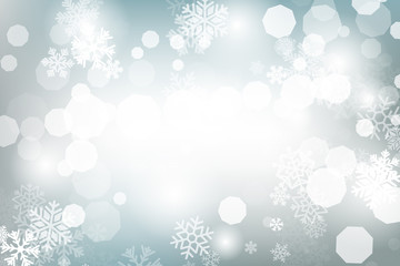 Winter glowing background. Vector holiday banner with lights, bokeh and snowflakes. Seasonal soft backdrop.