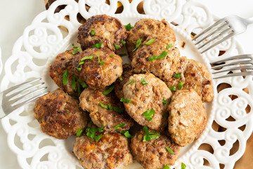Top view of ready to eat meatballs with porcini mushrooms (edible Boletus)
