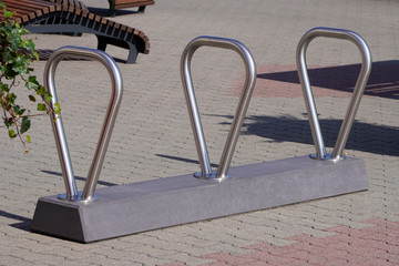 modern iron Parking for bicycles, eco-friendly mode of transport, healthy lifestyle. the sleek design of Parking, urban view in the city.