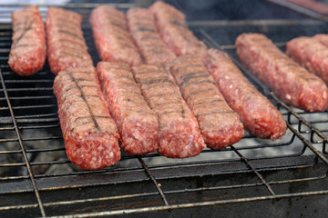 Closeup of sausage on the grill