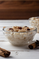Delicious peruvian dessert arroz con leche, rice with milk, cinnamon and rises