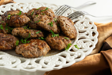 Top view of ready to eat meatballs with porcini mushrooms (edible Boletus)