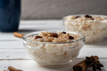 Delicious peruvian dessert arroz con leche, rice with milk, cinnamon and rises