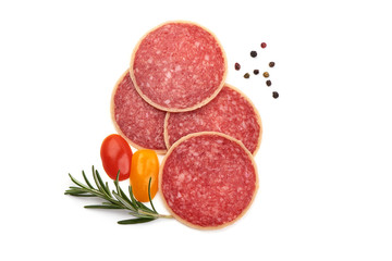 Salami sliced. Raw smoked sausage slices with herbs and spices, isolated on white background