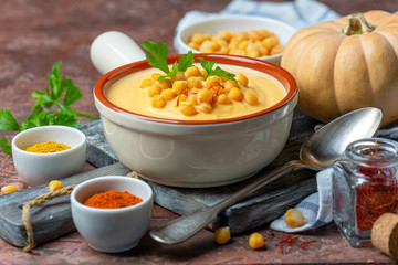 Spicy pumpkin cream soup with chickpeas.
